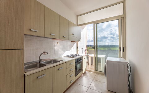 Andromeda Apartment In Gallipoli: Cabinetry, Furniture, Countertop, Sink, Kitchen Sink, Property, Tap, Wood, Interior Design, Building