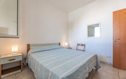 Andromeda Apartment In Gallipoli: Furniture, Property, Building, Comfort, Azure, Wood, Textile, Bed Frame, Bed