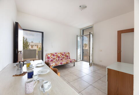 Andromeda Apartment In Gallipoli: Furniture, Table, Tableware, Building, Wood, Comfort, Interior Design, Flooring, Floor