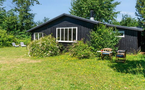 Krister - 900M from the Sea: Roof, House, Home, Cottage, Siding, Estate, Driveway, Garden Buildings, Yard, Shed