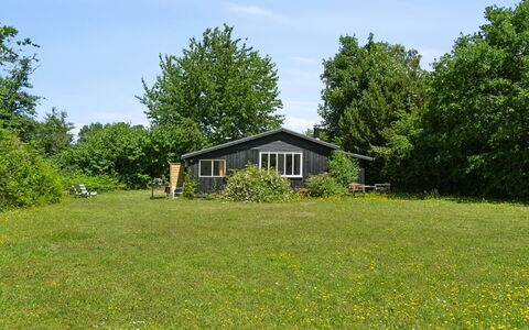Krister - 900M from the Sea: Roof, House, Home, Cottage, Siding, Estate, Driveway, Garden Buildings, Yard, Shed
