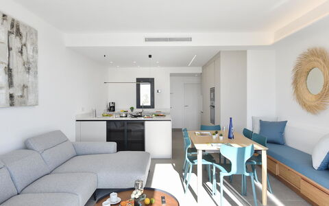 Yucas 1: Table, Furniture, Couch, Property, Living Room, Lighting, Interior Design, Picture Frame, Floor