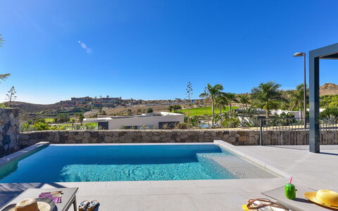 Yucas 1: Water, Sky, Plant, Swimming Pool, Azure, Tree, Outdoor Furniture, Leisure, Residential Area, Condominium