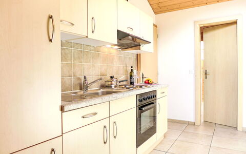 Bühl: Cabinetry, Countertop, Kitchen Sink, Sink, Tap, Kitchen Stove, Kitchen Appliance, Building, Door, Wood