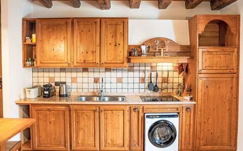 La Meridiana: Kitchen, Wood, Countertop, Cabinetry, Interior Design, Major Appliance, Flooring, Furniture, Sink, Kitchen Appliance