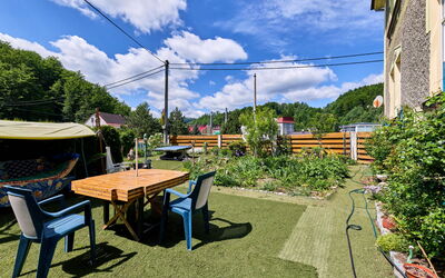 Desná V Jizerských Horách 841: Garden, Backyard, Shade, Outdoor Table, Yard, Outdoor Furniture, Chair, Landscaping, Courtyard, Eco Hotel