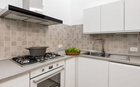 La Casa dei Nonni: Kitchen, Kitchen Appliance, Countertop, Major Appliance, Kitchen Stove, Stove, Flooring, Cabinetry, Gas Stove, Home Appliance