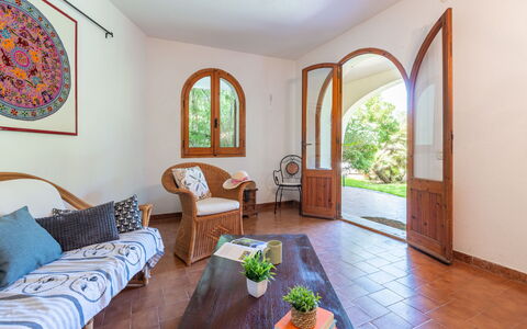 Approdo: Furniture, Table, Property, Window, Couch, Building, Plant, Azure, Houseplant, Wood
