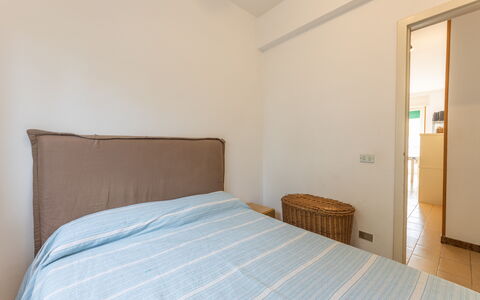 Apartment Living In Baia Verde - Gallipoli: Furniture, Comfort, Azure, Textile, Wood, Shade, Bed, Building, Pillow
