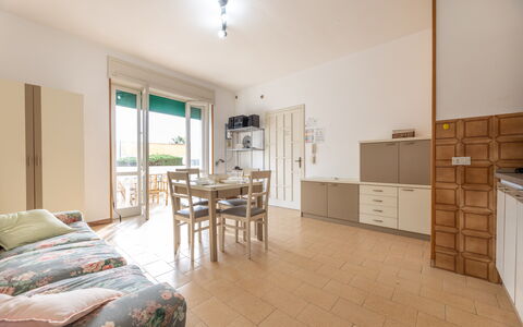 Apartment Living In Baia Verde - Gallipoli: Furniture, Cabinetry, Property, Table, Wood, Lighting, Interior Design, Flooring, Countertop, Floor