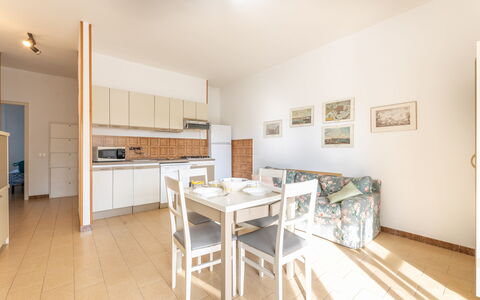 Apartment Living In Baia Verde - Gallipoli: Furniture, Table, Cabinetry, Building, Picture Frame, Wood, Interior Design, House, Flooring, Living Room