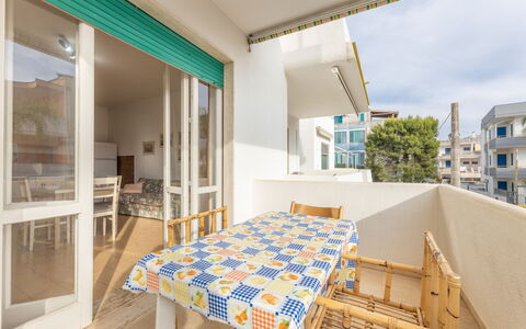 Apartment Living In Baia Verde - Gallipoli: Property, Table, Building, Azure, Wood, Interior Design, Lighting, Architecture, Chair, Flooring