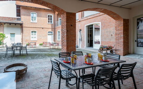 Le Corti di San Rocco: Table, Furniture, Property, Couch, Azure, Wood, Living Room, Interior Design, Floor, Comfort