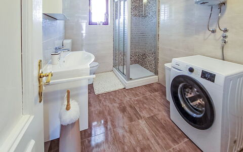 Sonja: Flooring, Floor, Interior Design, Plumbing Fixture, Washing Machine, Ceiling, Sink, Room, Lighting, Bathroom