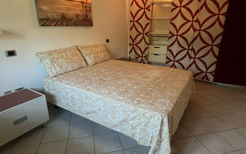 Bell'aria Apartment: Furniture, Comfort, Wood, Building, Flooring, Floor, House, Decoration, Hardwood, Bed Frame