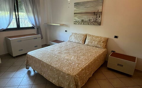 Bell'aria Apartment: Property, Furniture, Window, Table, Comfort, Wood, Building, Drawer, Flooring, Bed Frame