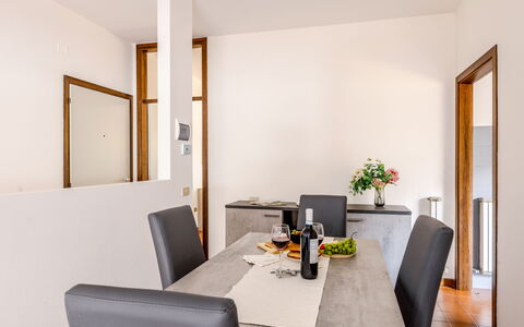 Fano Suite Apartment: Property, Furniture, Table, Building, Flowerpot, Plant, Comfort, Houseplant, Orange, Interior Design