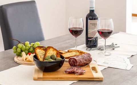 Fano Suite Apartment: Food, Tableware, Stemware, Table, Wine, Wine Glass, Plate, Bottle, Drinkware