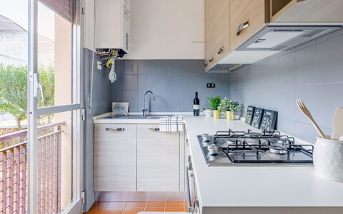 Fano Suite Apartment: Kitchen Sink, Cabinetry, Building, Countertop, Tap, Sink, Kitchen Stove, Kitchen Appliance, Kitchen, House
