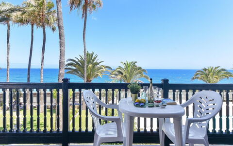 Ocean Views Arpones 16: Sky, Water, Property, Plant, Seaside Resort, Azure, Table, Tree, Outdoor Furniture, Arecales