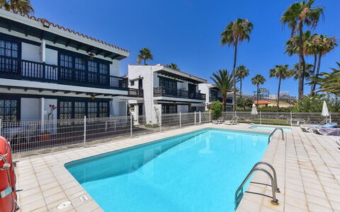 Ocean Views Arpones 16: Water, Sky, Plant, Swimming Pool, Building, Azure, Tree, Leisure, Body Of Water, Condominium