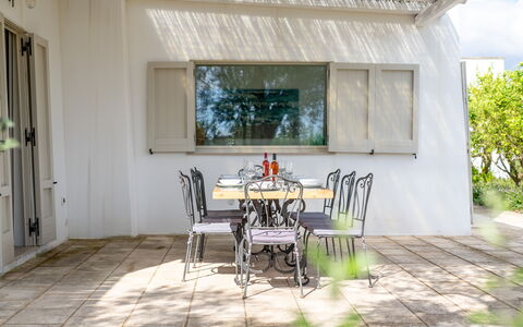 Villa Monamu: Furniture, Table, Building, Window, Plant, Wood, Chair, Interior Design, Tree, Shade