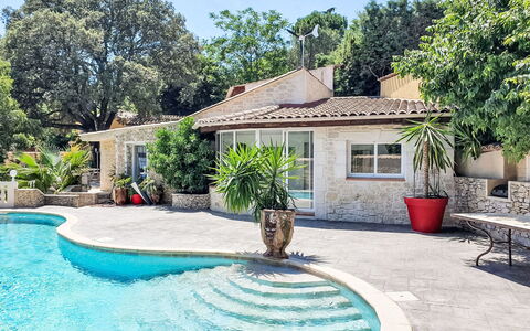 Villa du Soleil: Water, Plant, Sky, Building, Property, Window, Flowerpot, Azure, Tree, Architecture