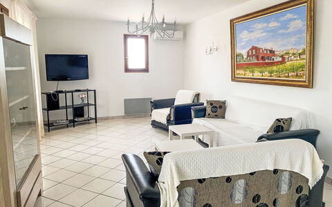 Villa Rose: Picture Frame, Table, Property, Furniture, Couch, Interior Design, Chair, Lighting, Living Room, Wood