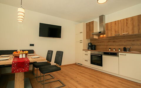 Ferienwohnung Selina: Cabinetry, Furniture, Countertop, Wood, Kitchen Stove, Table, Interior Design, Kitchen, Flooring, Floor