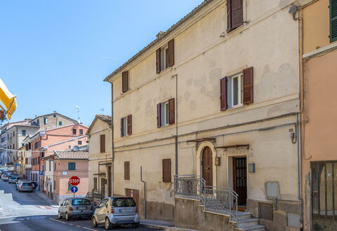 Loreto Suite Apartment: Building, Sky, Wheel, Property, Car, Window, Infrastructure, Vehicle, House