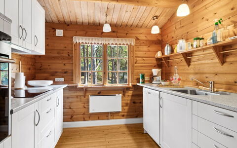 Sonya - 350M from the Sea: Kitchen, Wood, Countertop, Kitchen Appliance, Cabinetry, Major Appliance, Interior Design, Flooring, Sink, Kitchen Sink