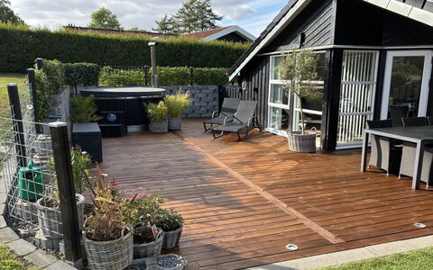 Enida - 350M to the Fjord: Wood, Flooring, Flowerpot, Wood Flooring, Floor, Furniture, Outdoor Furniture, Hardwood, Deck, Garden