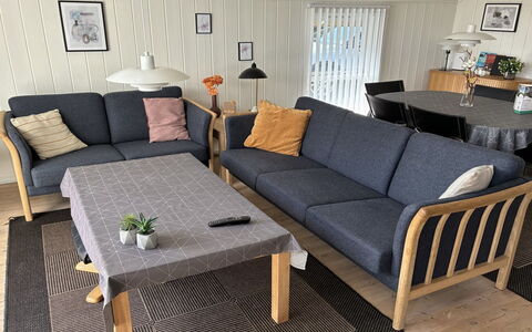 Enida - 350M to the Fjord: Wood, Furniture, Outdoor Furniture, Hardwood, Chair, Wood Stain, Armrest, Wood Flooring, Living Room, Coffee Table
