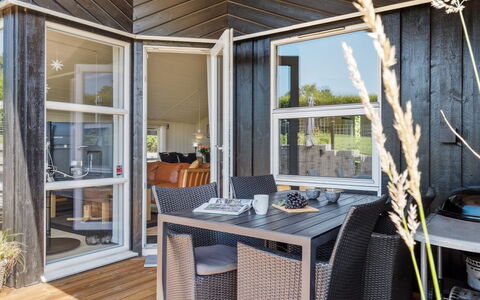 Enida - 350M to the Fjord: Wood, Furniture, Chair, Interior Design, Home, Door, Hardwood, Porch, Glass, Wood Stain
