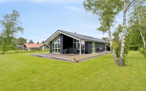 Hæryst - 300M from the Sea: Roof, House, Home, Cottage, Door, Siding, Deck, Porch, Plank, Hardwood