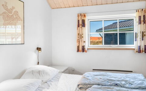 Winona - 600M from the Sea: Wood, Home, Bedroom, Door, Cottage, Ceiling, Bed, Daylighting, Sash Window, Bedding