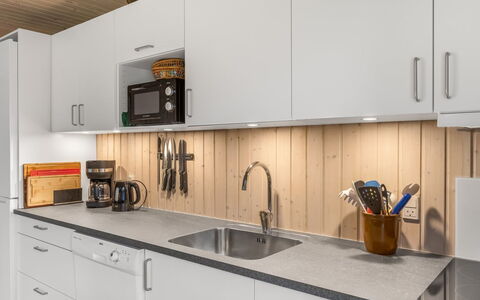 Gisella - 900M from the Sea: Kitchen, Countertop, Wood, Flooring, Kitchen Appliance, Interior Design, Cabinetry, Sink, Major Appliance, Floor