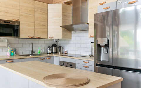 Villa Sirpia: Furniture, Kitchen, Countertop, Kitchen Appliance, Cabinetry, Flooring, Interior Design, Wood, Home Appliance, Major Appliance