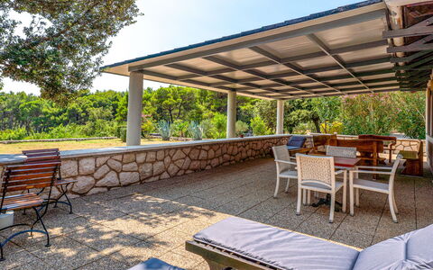 Dundo House: Shade, Furniture, Chair, Outdoor Furniture, Resort, Garden, Outdoor Structure, Eco Hotel, Estate, Patio