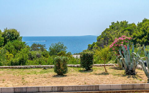 Dundo House: Blue, Green, Leaf, Vegetation, Shrub, Plant Community, Garden, Sea, Ocean, Landscaping
