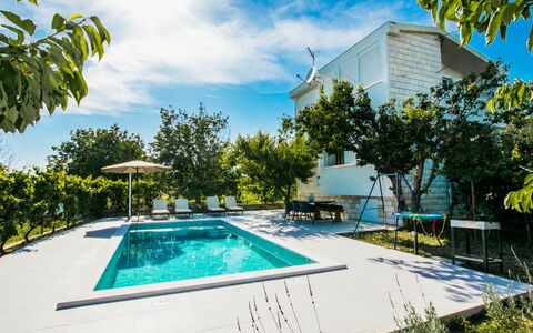 Kastel Mila: Sky, Property, Furniture, Table, Azure, Chair, Building, Window, Shade, Architecture