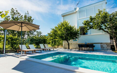 Kastel Mila: Sky, Property, Furniture, Table, Azure, Chair, Building, Window, Shade, Architecture