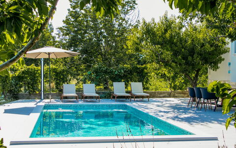 Kastel Mila: Sky, Property, Furniture, Table, Azure, Chair, Building, Window, Shade, Architecture