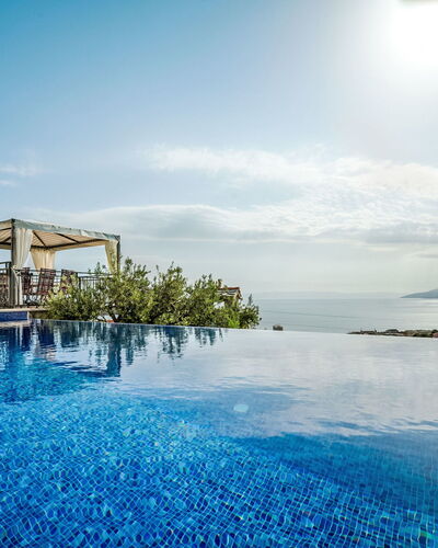 Bellavista: Sky, Property, Furniture, Table, Azure, Chair, Building, Window, Shade, Architecture