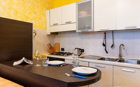 Soso: Sky, Property, Furniture, Table, Azure, Chair, Building, Window, Shade, Architecture