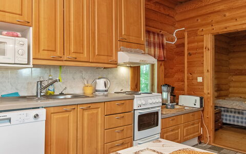Karhupirtti: Wood, Flooring, Interior Design, Kitchen, Floor, Cabinetry, Ceiling, Furniture, Drawer, Wood Stain