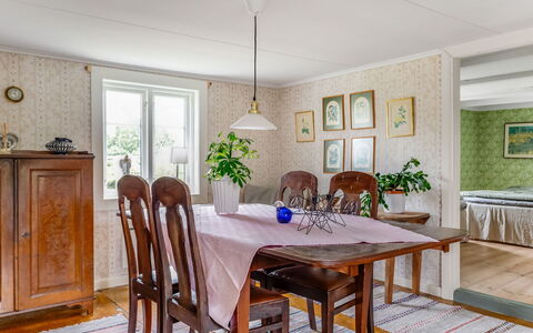 Blistorp: Table, Furniture, Property, Building, Plant, Window, Chair, Wood, Houseplant, Lighting
