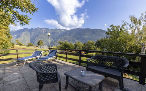 Casa Orai Mountain View: Cloud, Sky, Property, Furniture, Plant, Mountain, Outdoor Bench, Tree, Natural Landscape, Shade