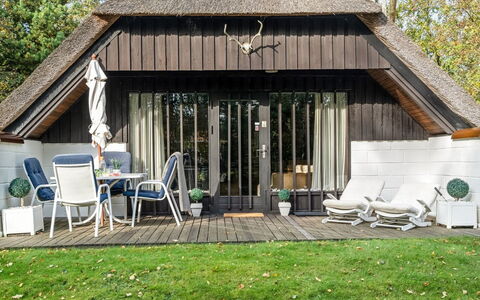 Adina - from the Sea: Wood, Roof, Cottage, Home, House, Furniture, Shade, Land Lot, Garden, Chair