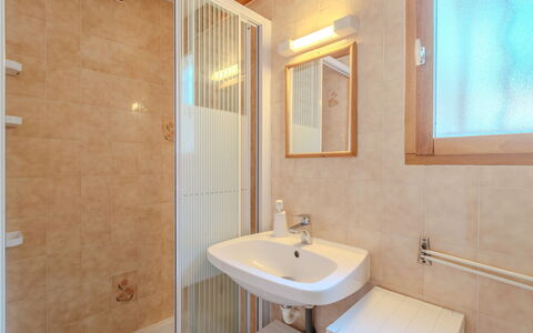 Les Maisons du Lac: Brown, Mirror, Tap, Plumbing Fixture, Sink, Property, Bathroom Sink, Bathroom, Wood, Interior Design